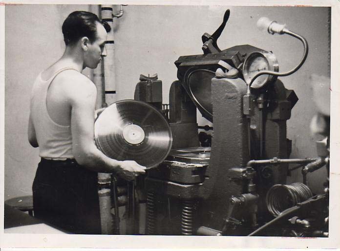 A press for 16 inch transcription discs